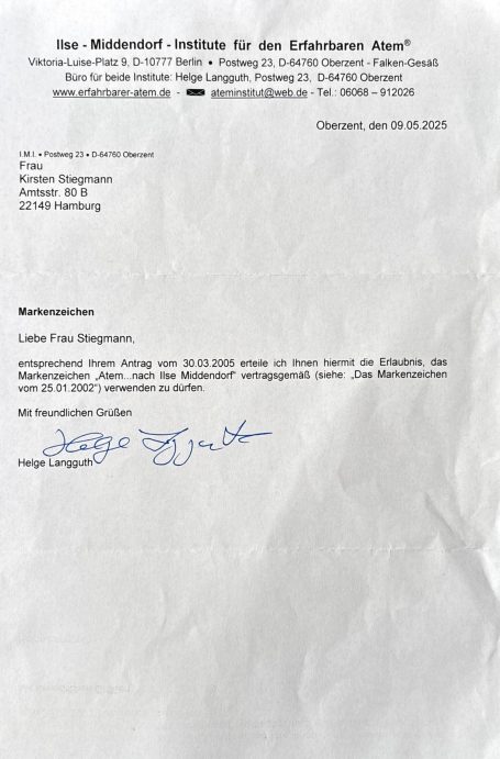 Ein offizielles Dokument mit Briefkopf, Datum und handschriftlicher Unterschrift.